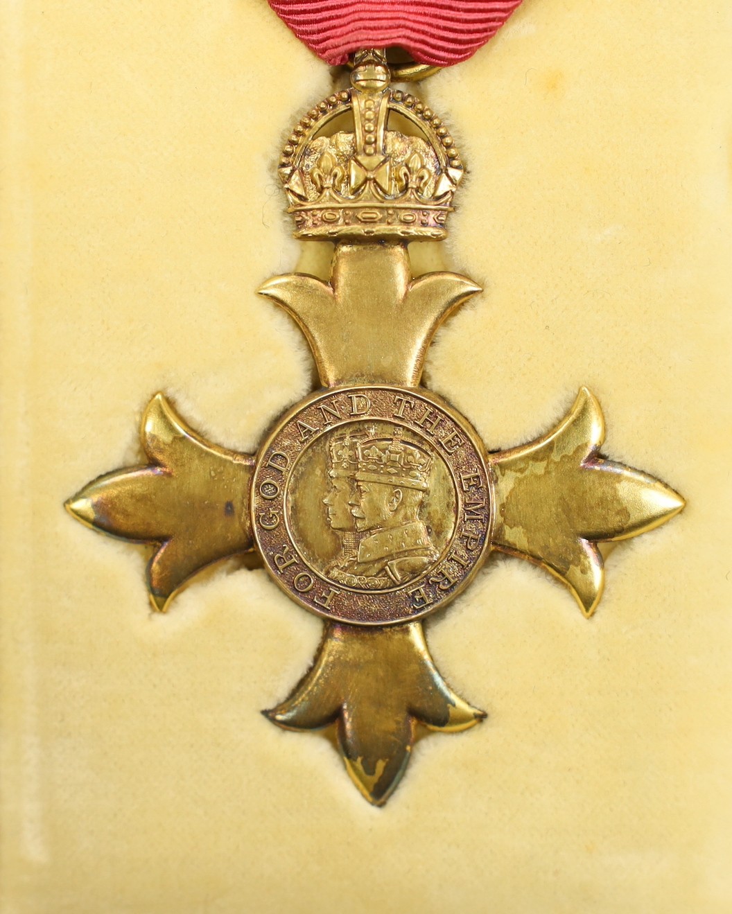 A cased O.B.E. Medal